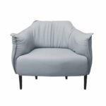 King Grey-Light Blue Armchair Discover the comfort and elegance of the King Grey-Light Blue armchair, perfect for any office or living space. With a metal frame and faux leather upholstery, this armchair offers style and ergonomic support. Ideal dimensions for an added touch of relaxation.