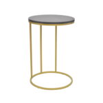 Rondo Golden Notebook Table Discover the Rondo Golden Notebook Table, perfect for any space. Ideal for coffee or as a desk, it adds a touch of elegance to the living room. A practical and stylish piece of furniture for a modern living area. Adjust your style with this unique table!