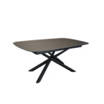 Velma Black Table Discover the Velma Black Table, an elegant choice for any kitchen. With a tempered glass top and a durable metal frame, this table easily extends for family gatherings. Transform every meal into a memorable experience!