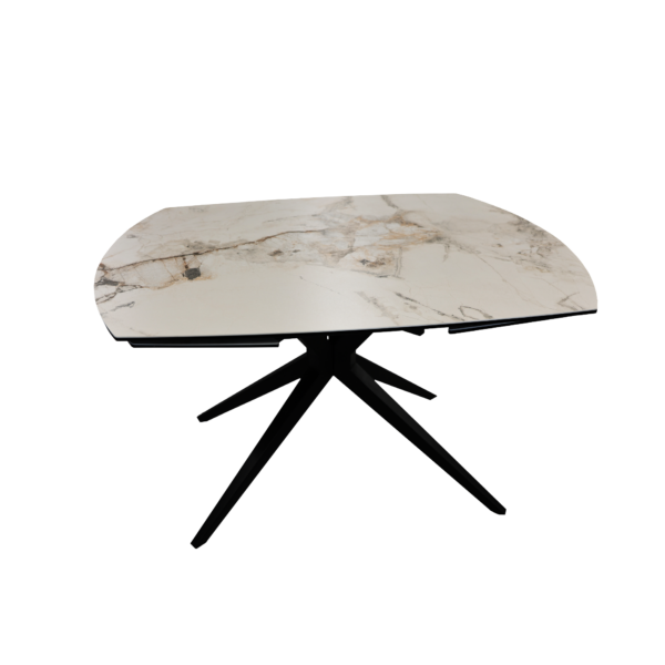 Chara White Extendable Table 130/190×95 Discover the Chara Table - made of heat-resistant ceramic and tempered glass, offering a modern and sophisticated design, perfect for any elegant dining experience.Thanks to the innovative rotary extension mechanism, the table expands quickly and easily, reaching a length of up to 190 cm, with a width of 95 cm and a height of 76 cm, ensuring optimal comfort for any occasion - from intimate dinners to festive gatherings.